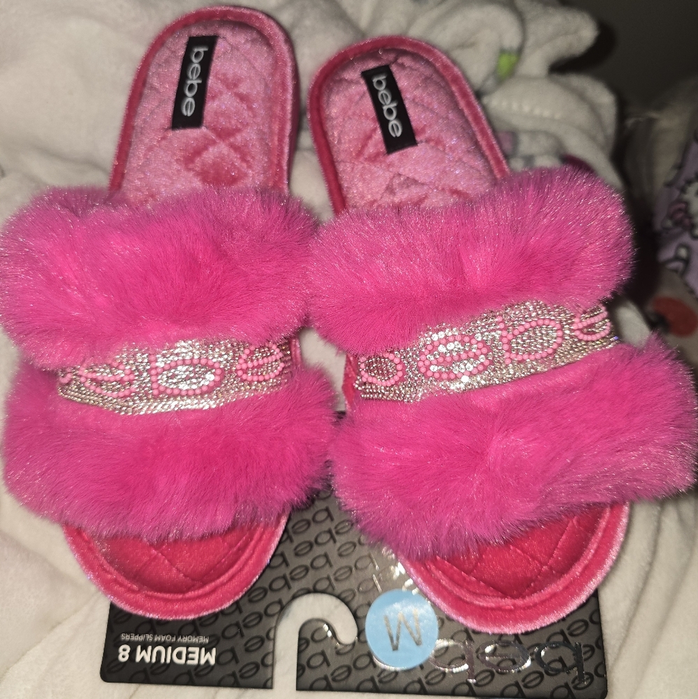 Pink fuzzy slippers by bebe